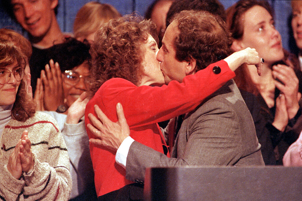 Paul Wellstone sharing a smooch